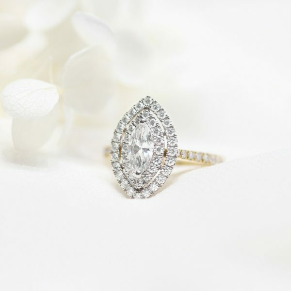 18ct yellow and white gold marquise diamond ring with halo