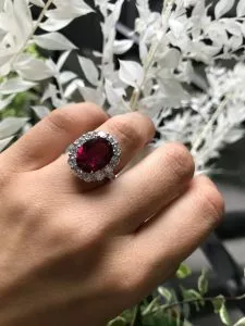18ct white gold 4.36ct oval shaped rubelite and diamond ring
