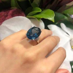 18ct white gold 24.29ct oval London blue topaz and diamond ring