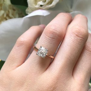 18ct rose & white gold Cushion Cut diamond solitaire ring.