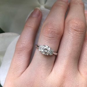 18ct White Gold Round & Oval Cut Three Stone Diamond Ring