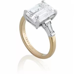 Platinum and rose gold emerald cut diamond ring