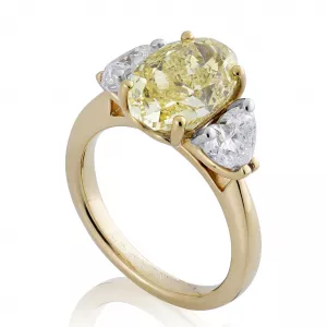 18ct yellow & white gold oval & heart three stone diamond ring