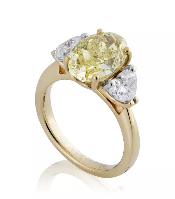 18ct yellow & white gold oval & heart three stone diamond ring