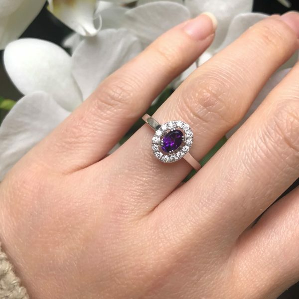 18ct white gold oval amethyst and diamond halo ring