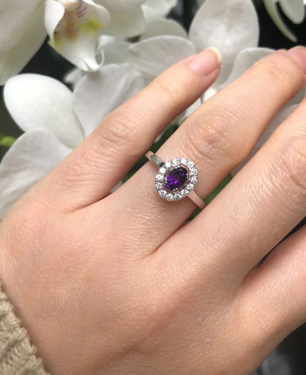 18ct white gold oval amethyst and diamond halo ring