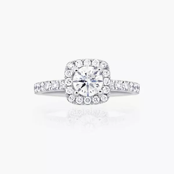 18ct white gold round diamond ring with cushion shape halo