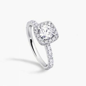 18ct white gold round diamond ring with cushion shape halo