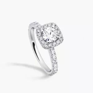 18ct white gold round diamond ring with cushion shape halo