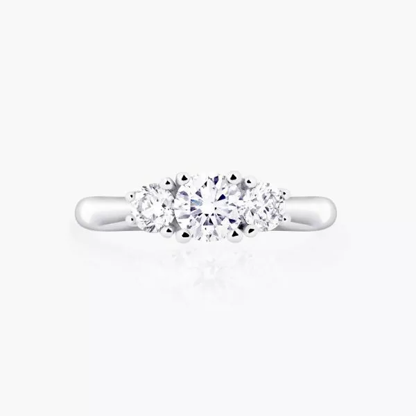 Platinum three stone round diamond ring