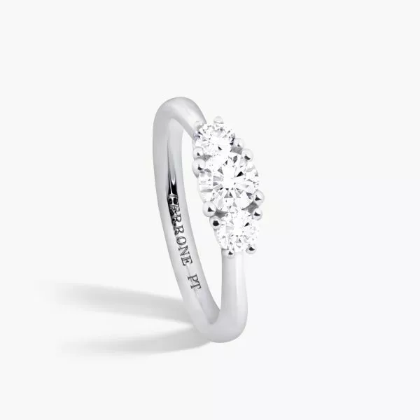 Platinum three stone round diamond ring