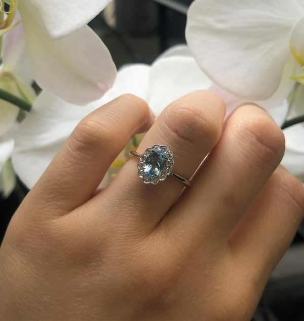 18ct white gold 0.85ct oval santa maria aquamarine & diamond halo ring