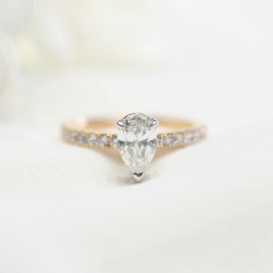 18ct rose and white gold 0.82ct G SI1 pear shaped diamond ring
