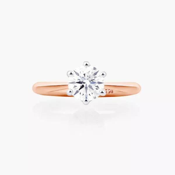 18ct rose and white gold 0.81ct F SI1 round diamond solitaire ring