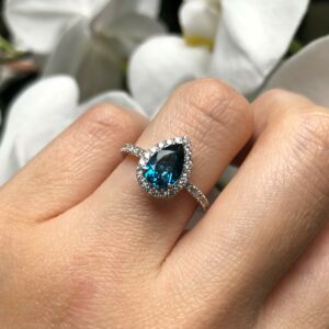 18ct white gold 1.57ct Pear London blue topaz and diamond halo ring