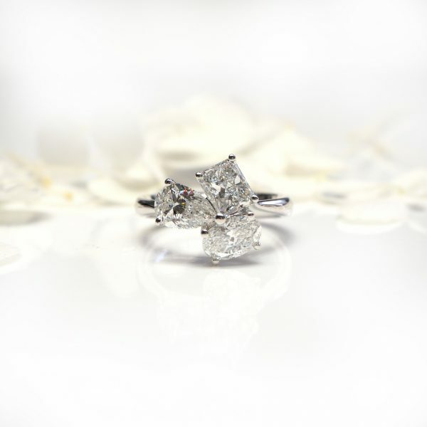 Platinum oval radiant pear diamond ring
