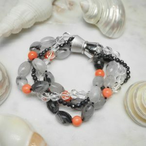 Crystal quartz, hemitite beads, dyed coral and black rutile Bracelet