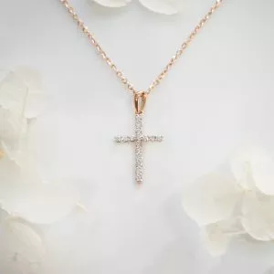 18ct rose gold claw set diamond cross necklace