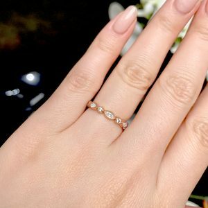 18ct rose gold marquise & round diamond ring