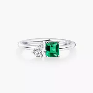 18ct white gold 0.48ct emerald cut emerald & 0.25ct pear diamond ring