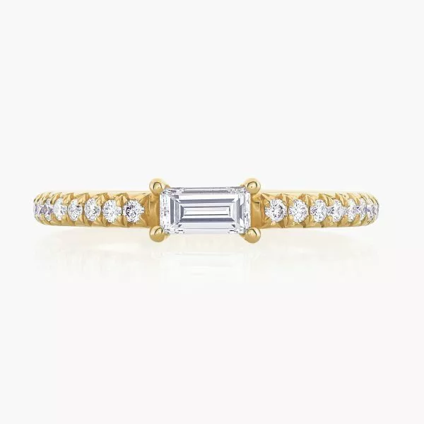 18ct yellow gold baguette & round brilliant cut diamond claw set ring