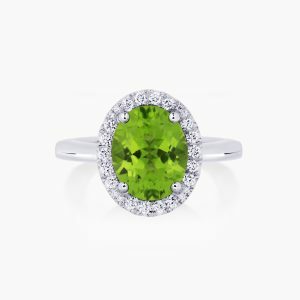 18ct white gold 2.82ct oval peridot and diamond halo ring