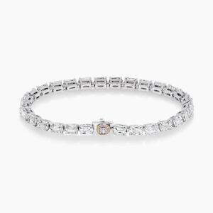Platinum and rose gold diamond tennis bracelet featuring pink diamonds