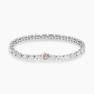 Platinum and rose gold diamond tennis bracelet featuring pink diamonds