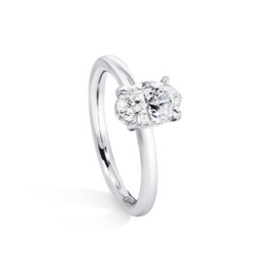 MILAN - 18ct white gold oval cut diamond solitaire four claw ring
