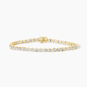 18ct yellow gold bezel set emerald, oval & round diamond tennis bracelet
