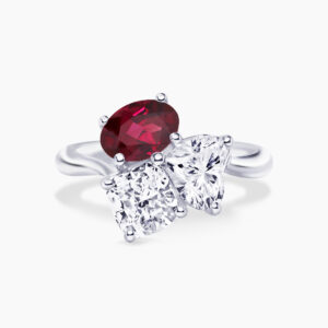 18ct white gold oval Mozambique ruby, cushion & heart shaped diamond ring
