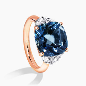 18ct rose gold cushion cut London blue topaz and diamond ring