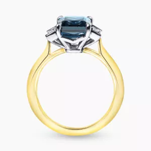 18ct yellow and white gold emerald cut topaz and diamond ring