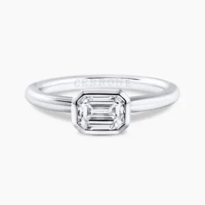 18ct white gold emerald cut bezel set diamond solitaire ring