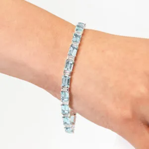 18ct white gold emerald cut aquamarines and baguette diamonds bracelet